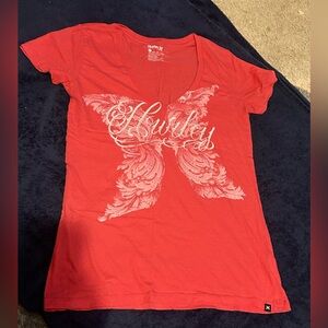 3!!! very nice Hurley v neck shirts. Size large